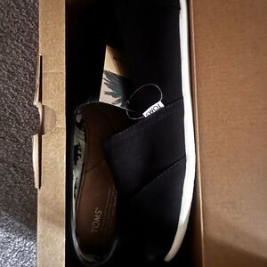 TOMS Black Canvas Slip-Ons